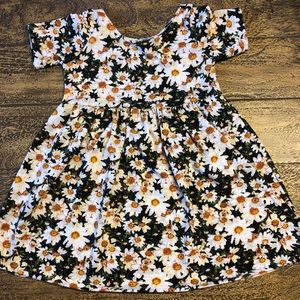 Rose and Belle baby doll dress in Daisy